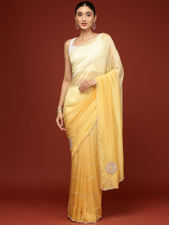 Neerus Yellow crepe embroidered saree - front view