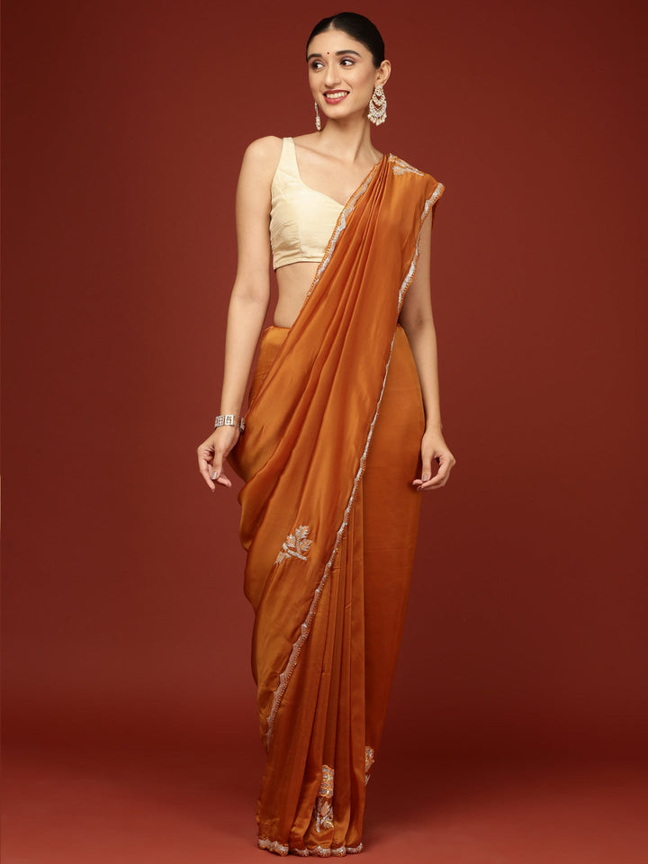 Neerus Yellow crepe hand embroidered saree - back view