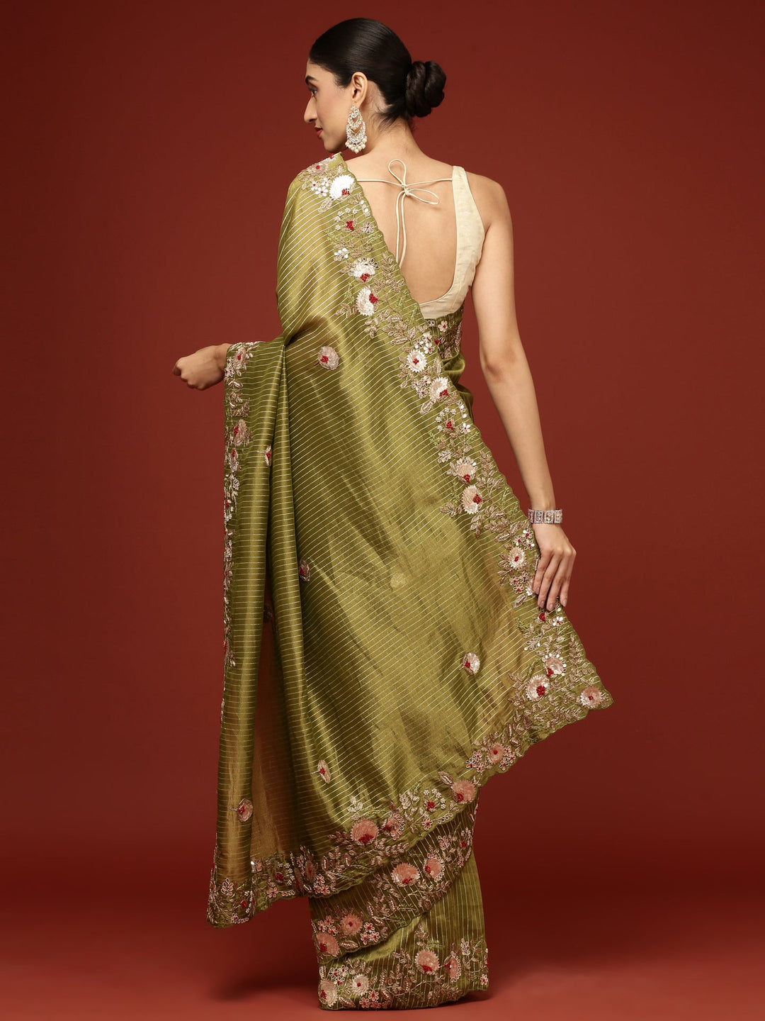 Neerus Green tissue hand embroidered saree - side view