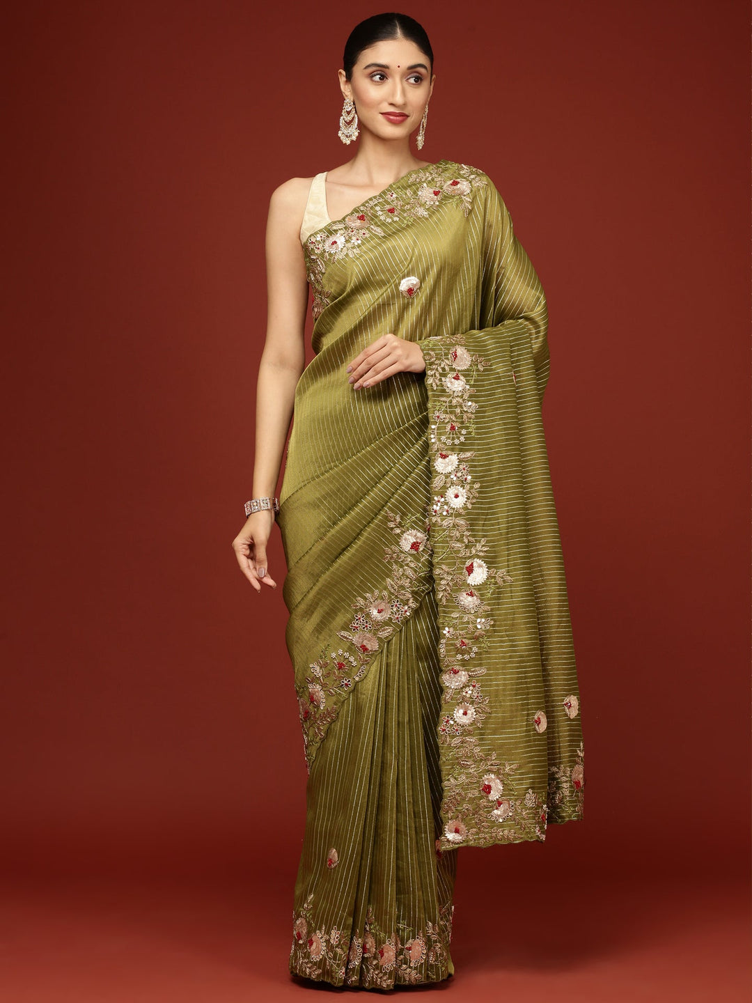 Neerus Green tissue hand embroidered saree - front view