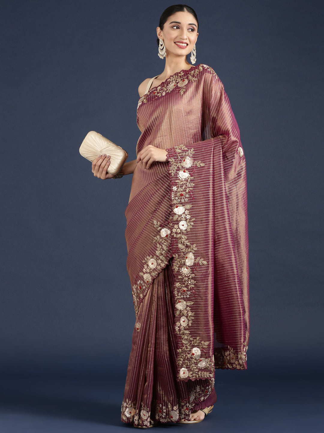 Neerus Maroon tissue hand embroidered saree - back view