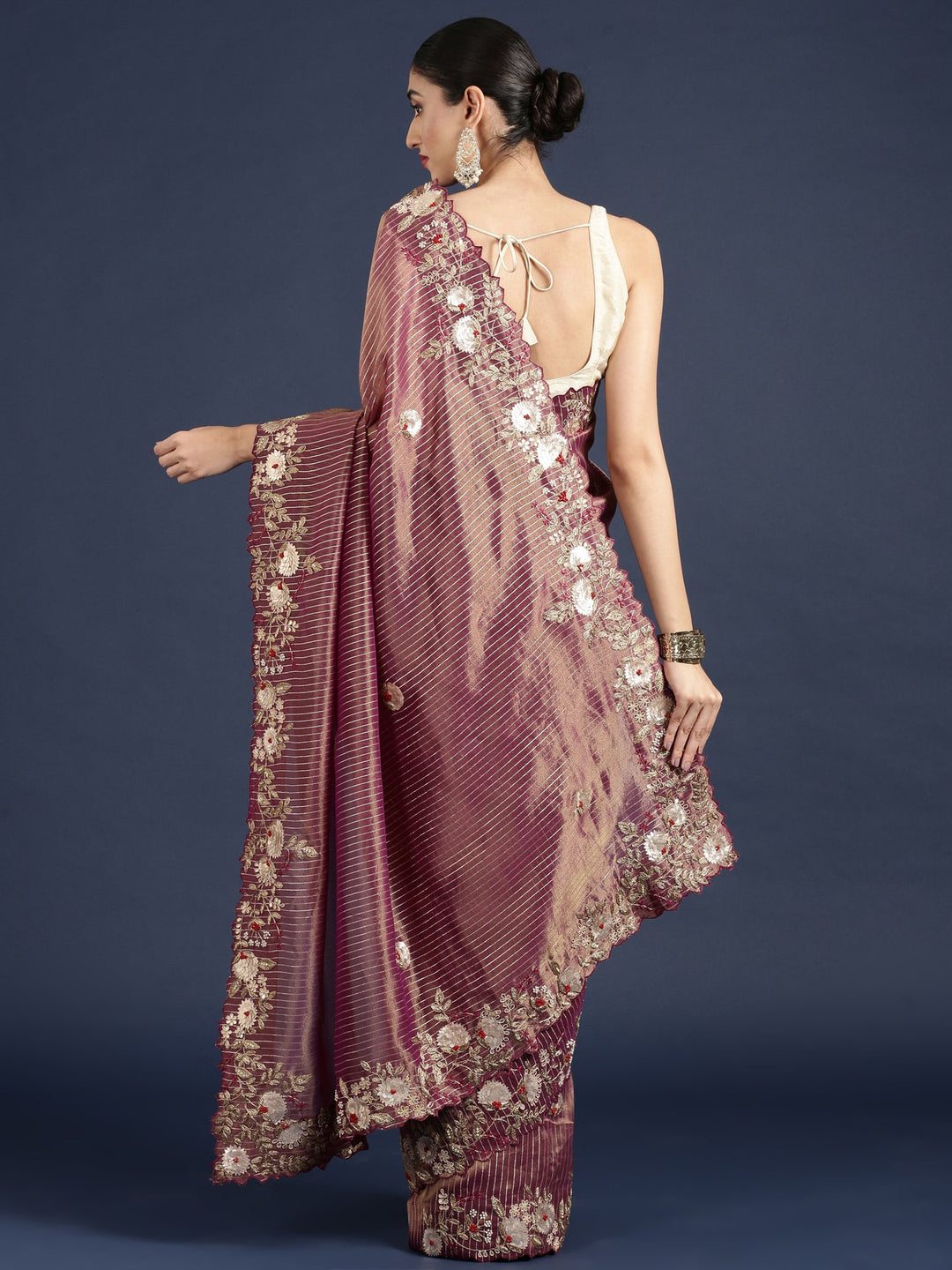 Neerus Maroon tissue hand embroidered saree - side view