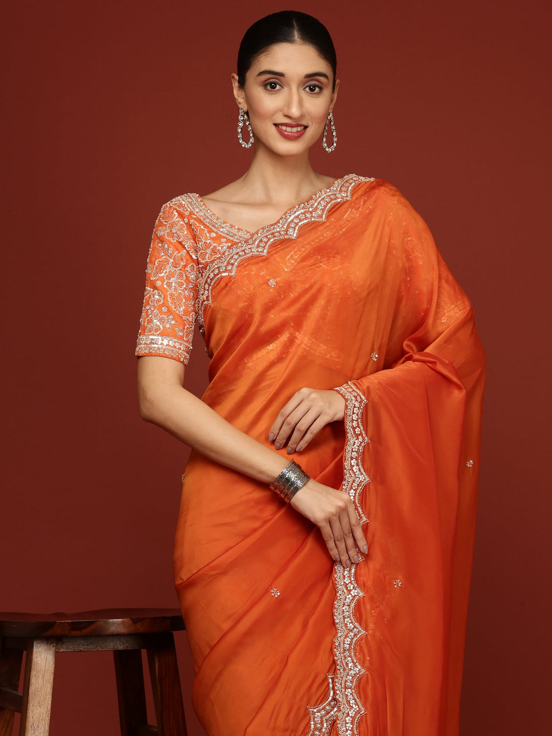 Neerus Orange crepe embellished saree with readymade blouse - detail view 1
