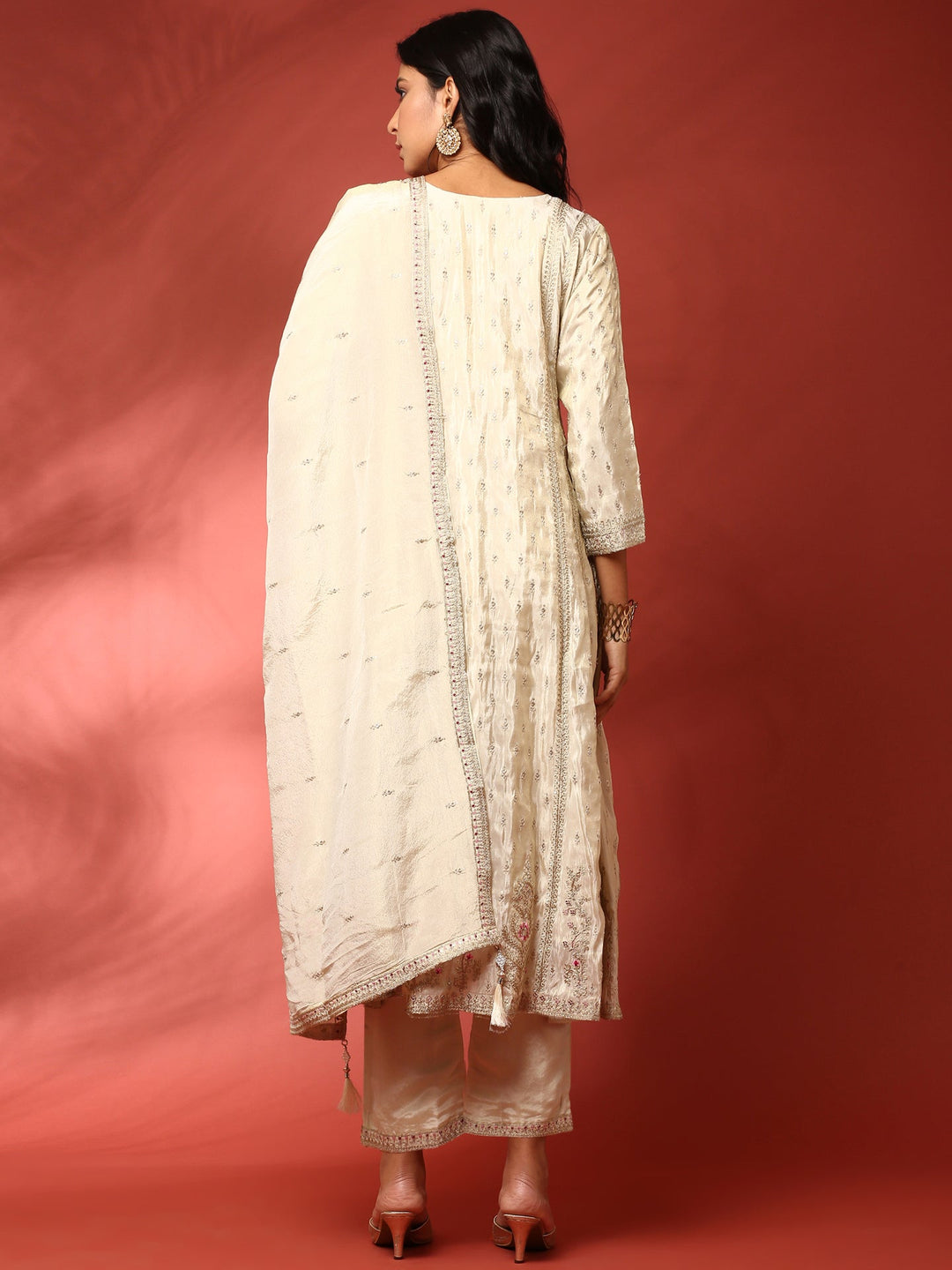 Neerus Beige tissue hand embroidered anarkali suit set - side view