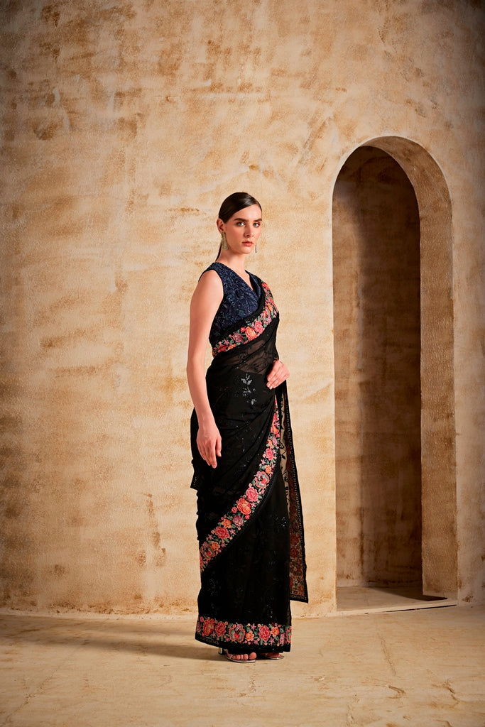 Neerus Black georgette solid saree - back view