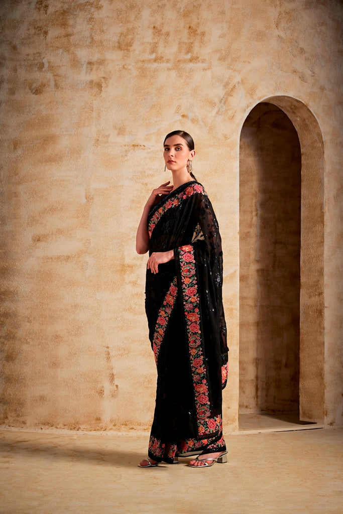 Neerus Black georgette solid saree - side view
