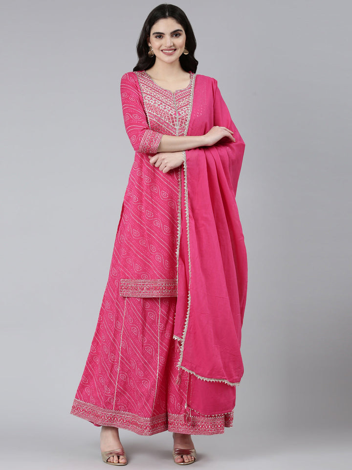 Neerus Pink Bandhani printed kurta set with palazzo and dupatta - front view