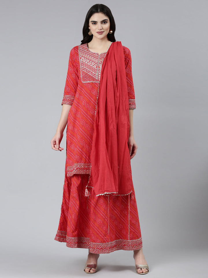 Neerus Red Bandhani printed kurta set with palazzo and dupatta - front view