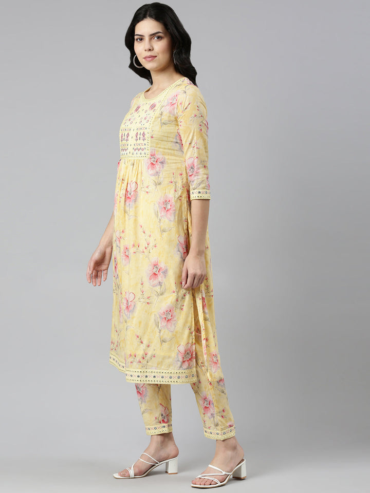 Neerus Yellow cotton printed kurta set with trouser and dupatta - back view