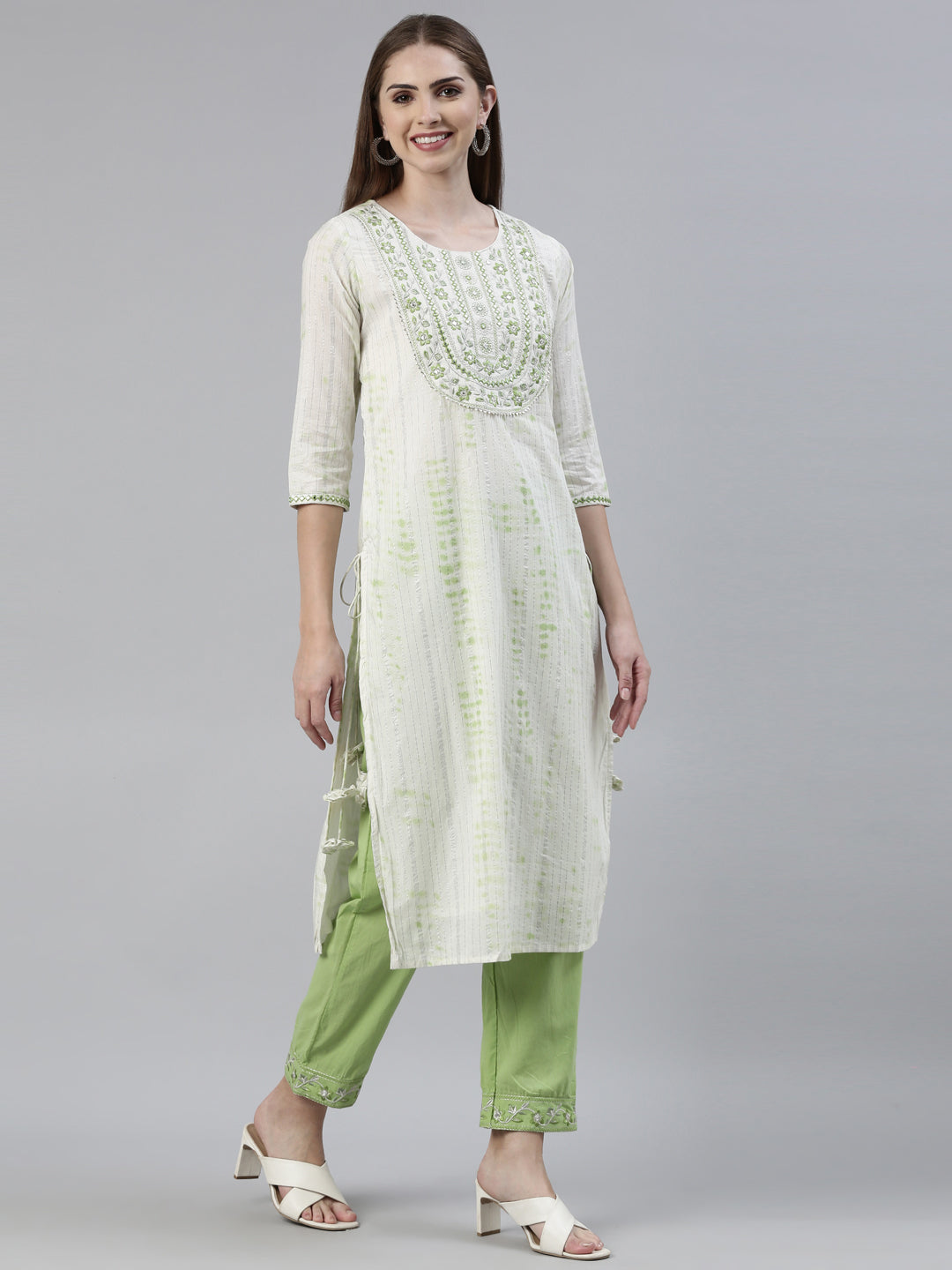 Neerus Green cotton printed kurta set with trouser and dupatta - back view