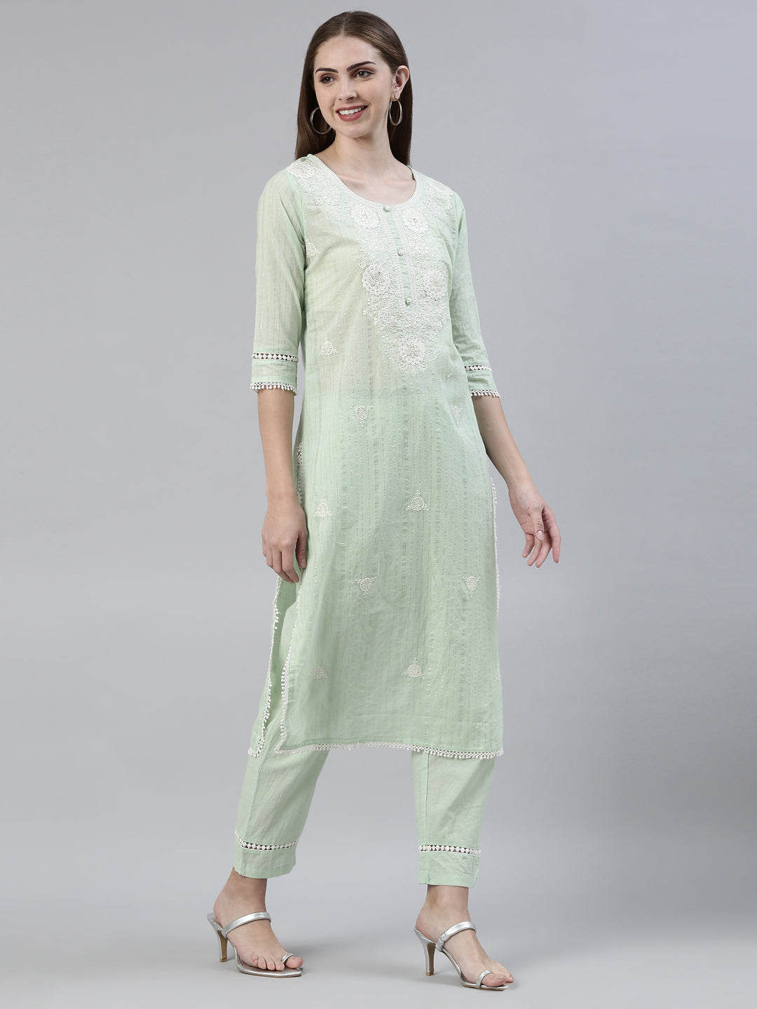 Neerus Green cotton embroidered kurta set - back view