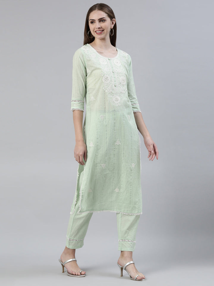Neerus Green cotton embroidered kurta set - back view