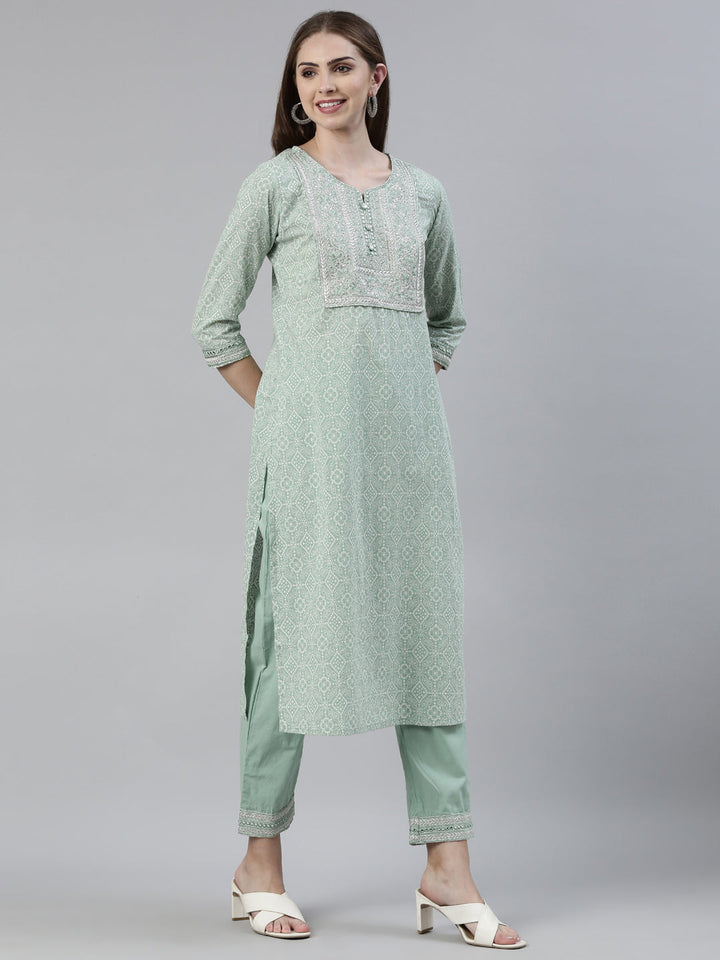 Neerus Green cotton printed kurta set with trouser and dupatta - back view