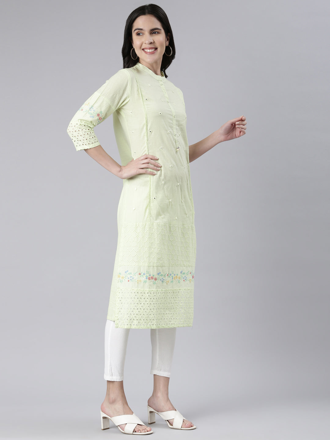 Neerus Green cotton solid straight kurti - back view