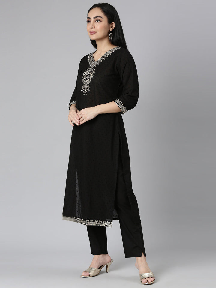 Neerus Black solid straight suit set with dupatta - back view