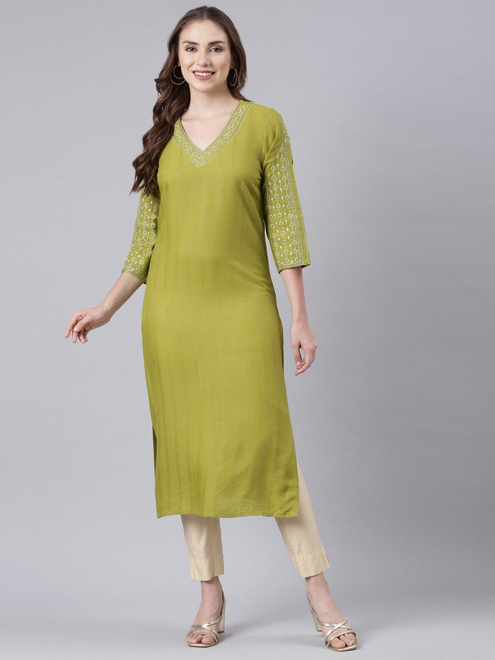 Neerus Green cotton printed straight kurta panelled - front view