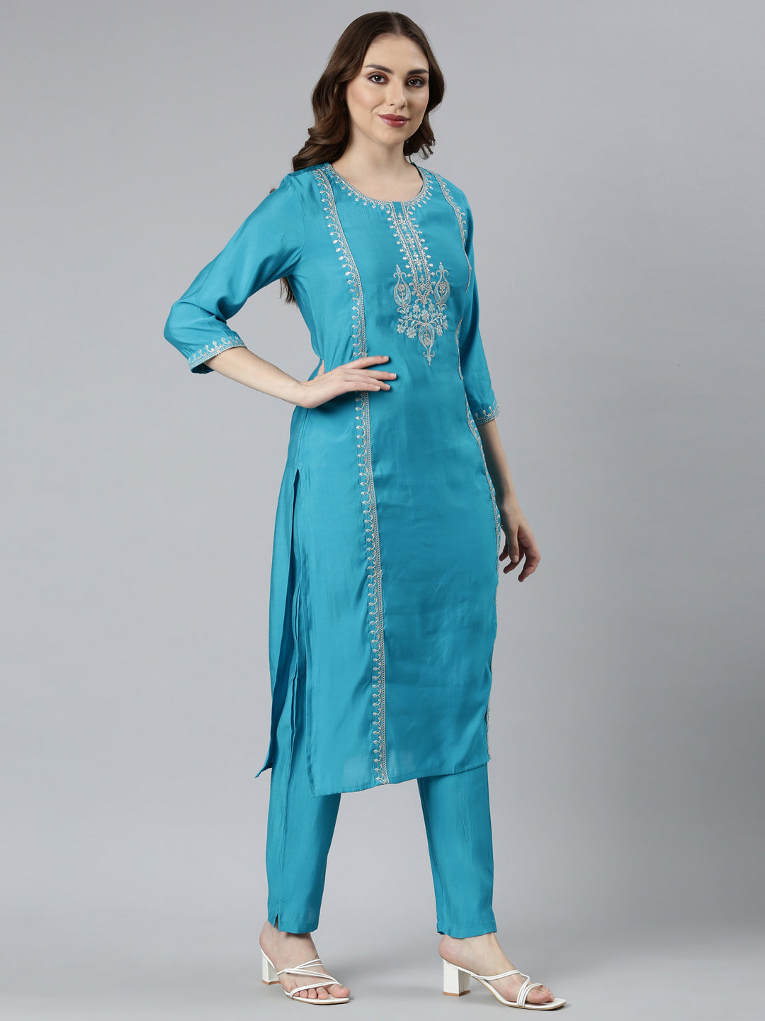Neerus Green solid straight suit set with dupatta - back view