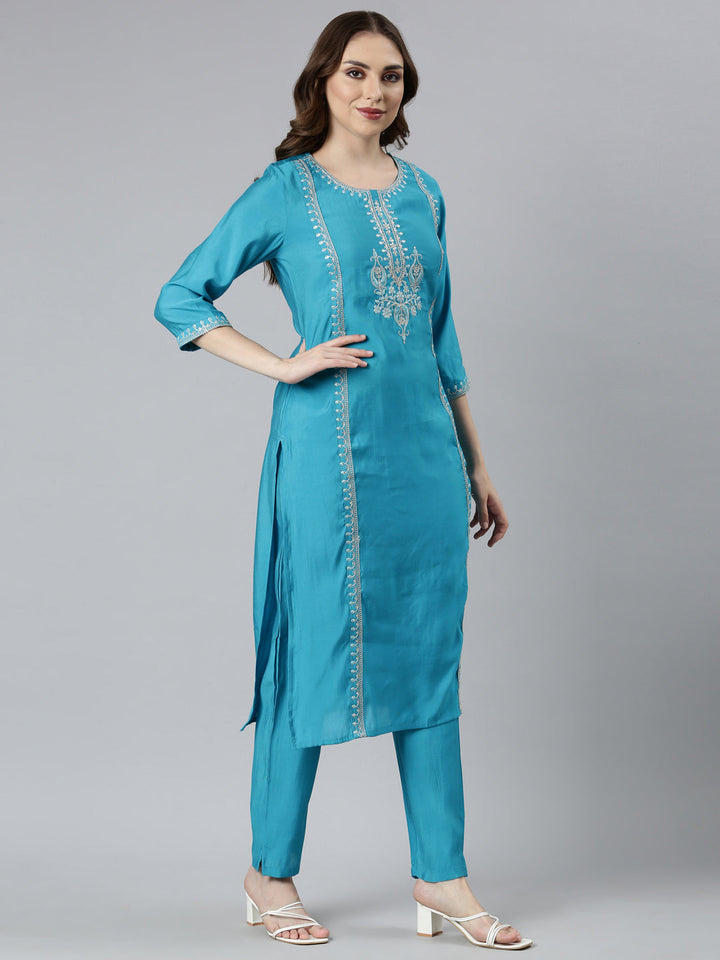 Neerus Green solid straight suit set with dupatta - back view