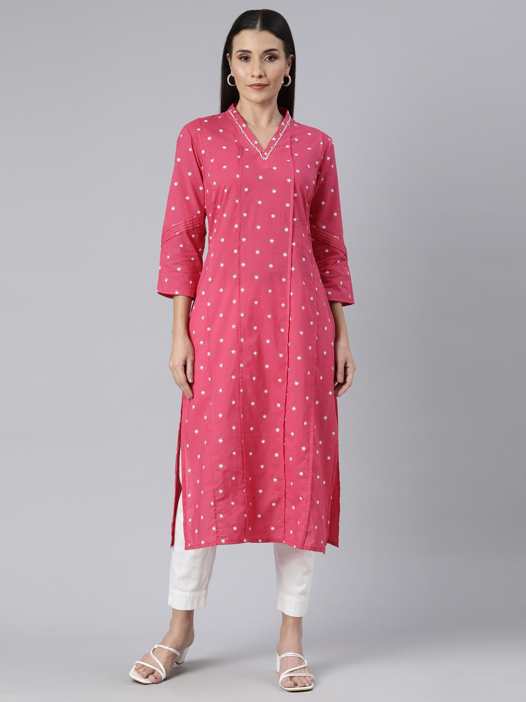 Neerus Pink floral printed panelled straight kurti - front view