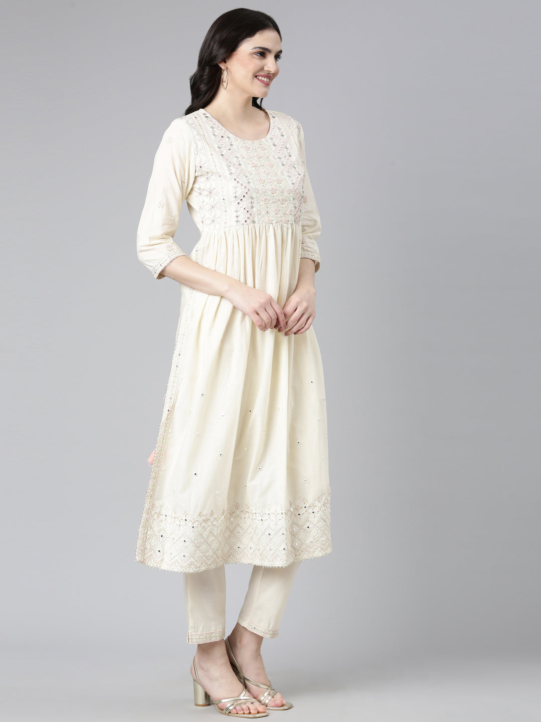 Neerus Beige cotton embroidered kurta set - back view