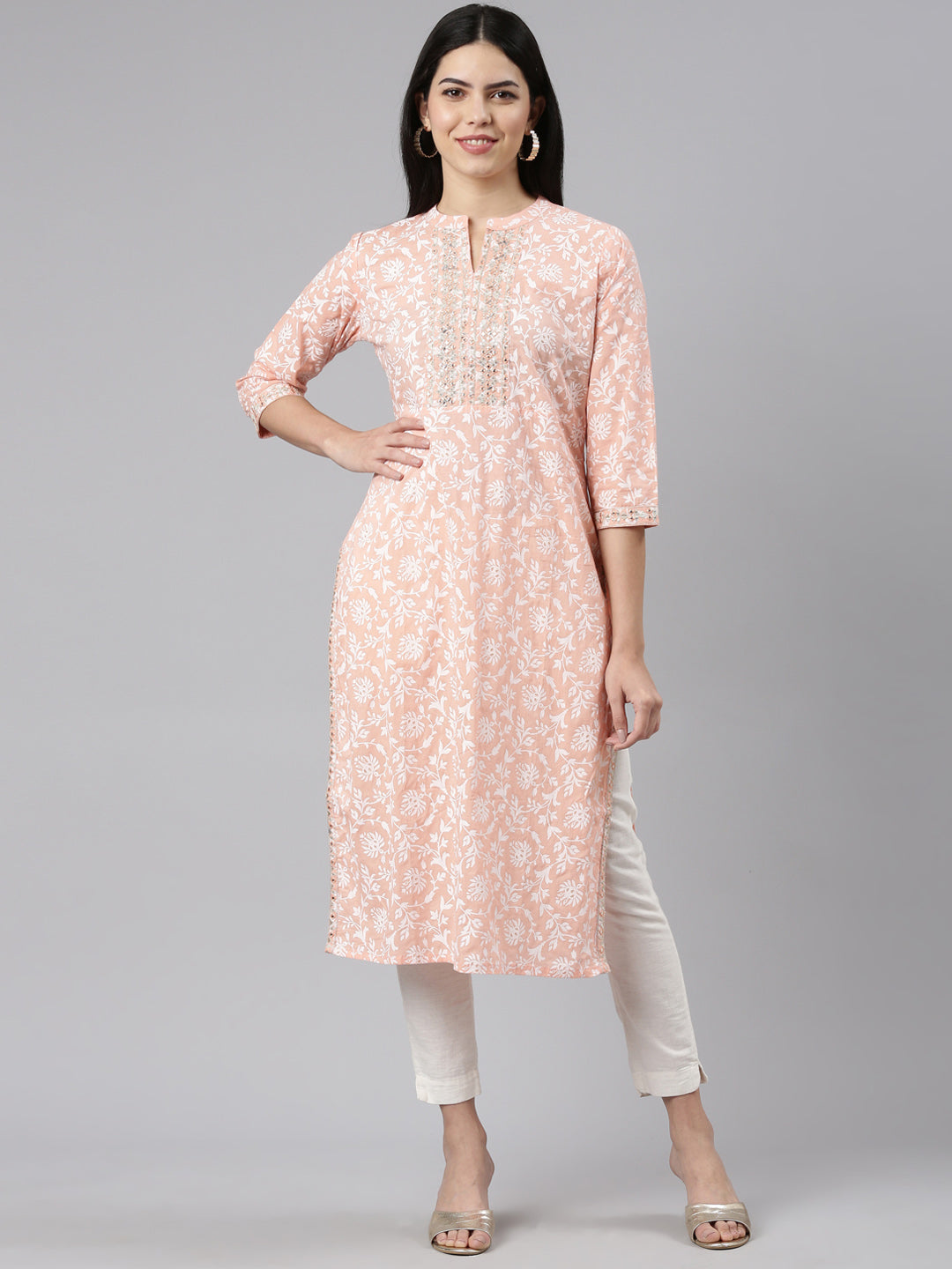 Neerus Orange printed straight kurti - front view
