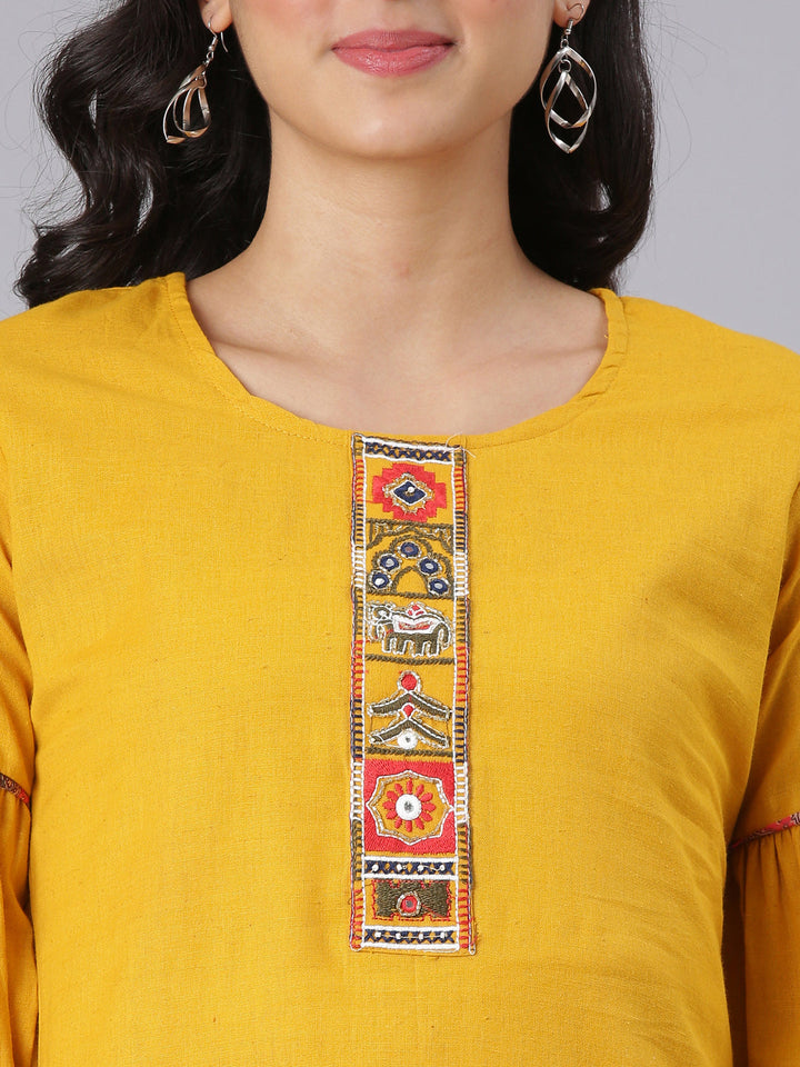 Neerus Mustard Solid Straight Kurta And Trousers