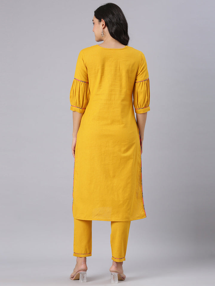 Neerus Mustard Solid Straight Kurta And Trousers