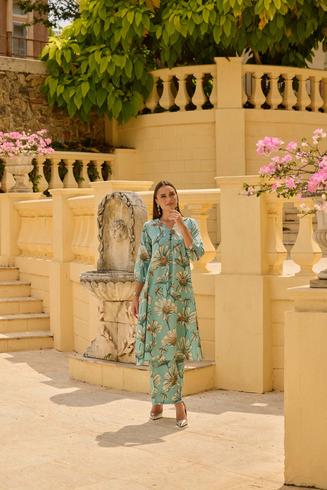 Neerus Green cotton printed kurta set with palazzo - back view