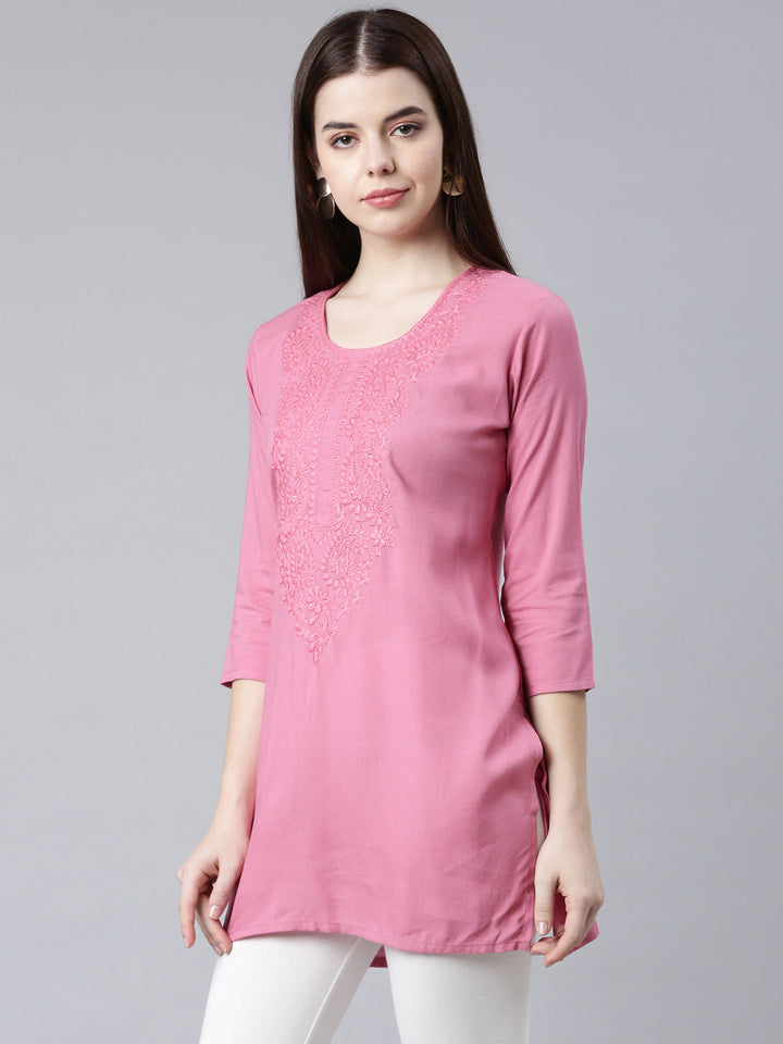 Neerus Pink rayon solid straight kurti - back view