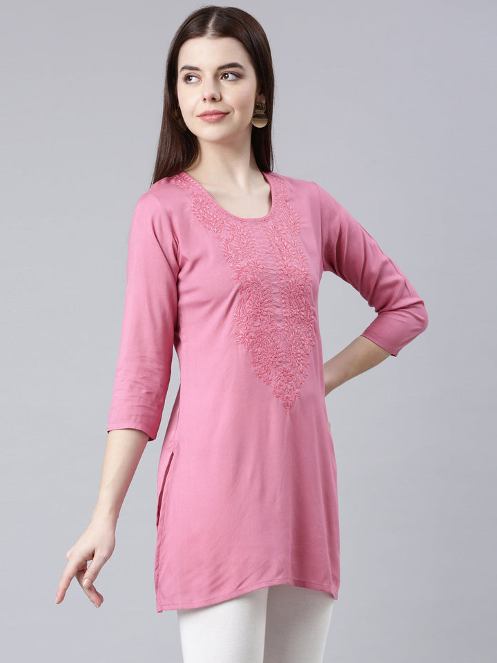 Neerus Pink rayon solid straight kurti - side view