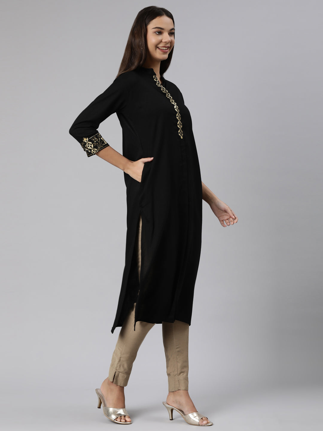 Neerus Black solid straight kurti - back view