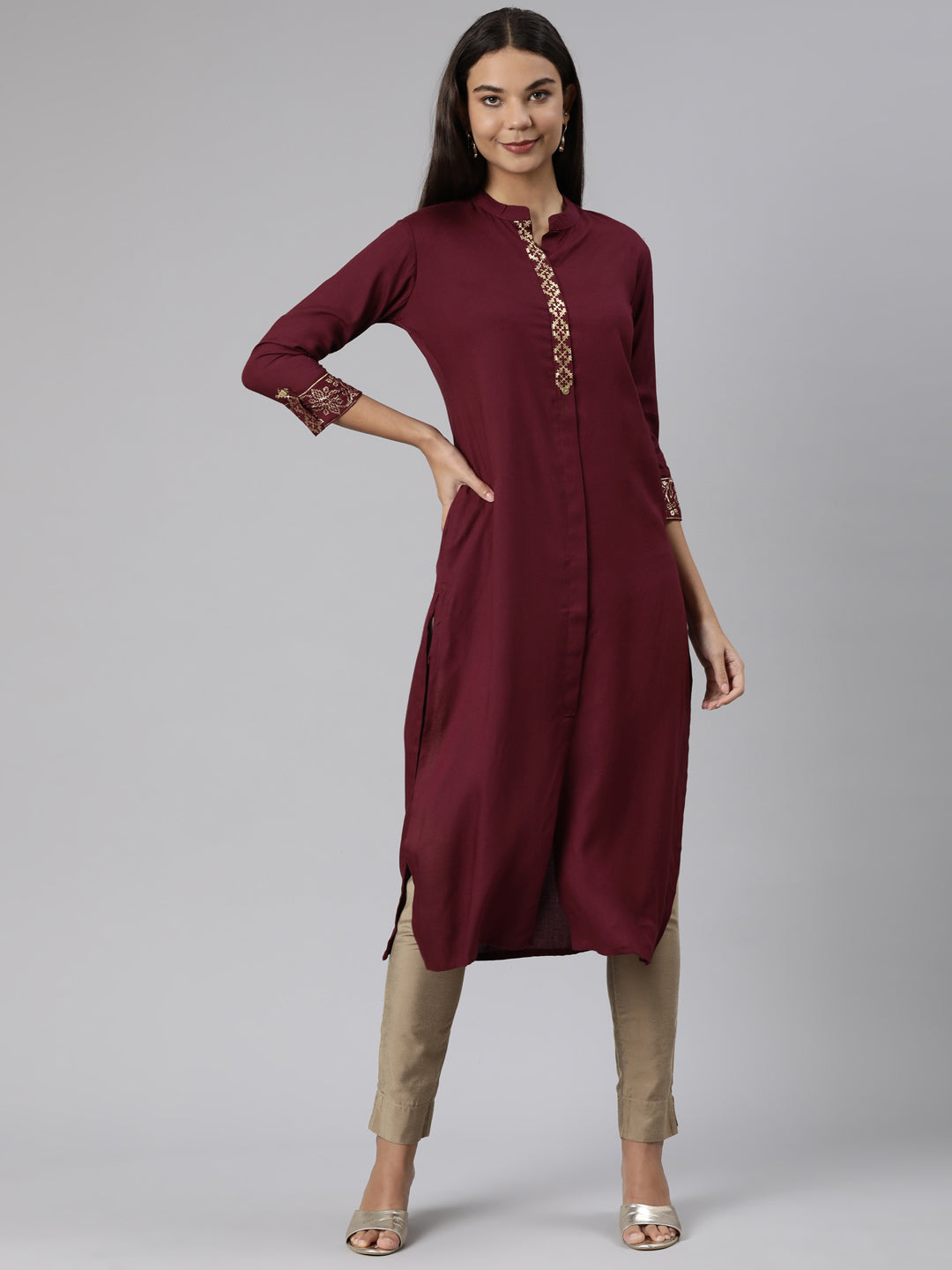 Neerus Maroon solid straight kurti - front view
