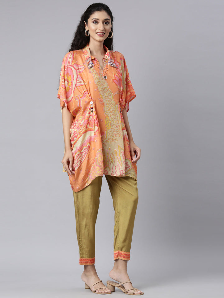 Neerus Orange muslin straight kurta set - back view