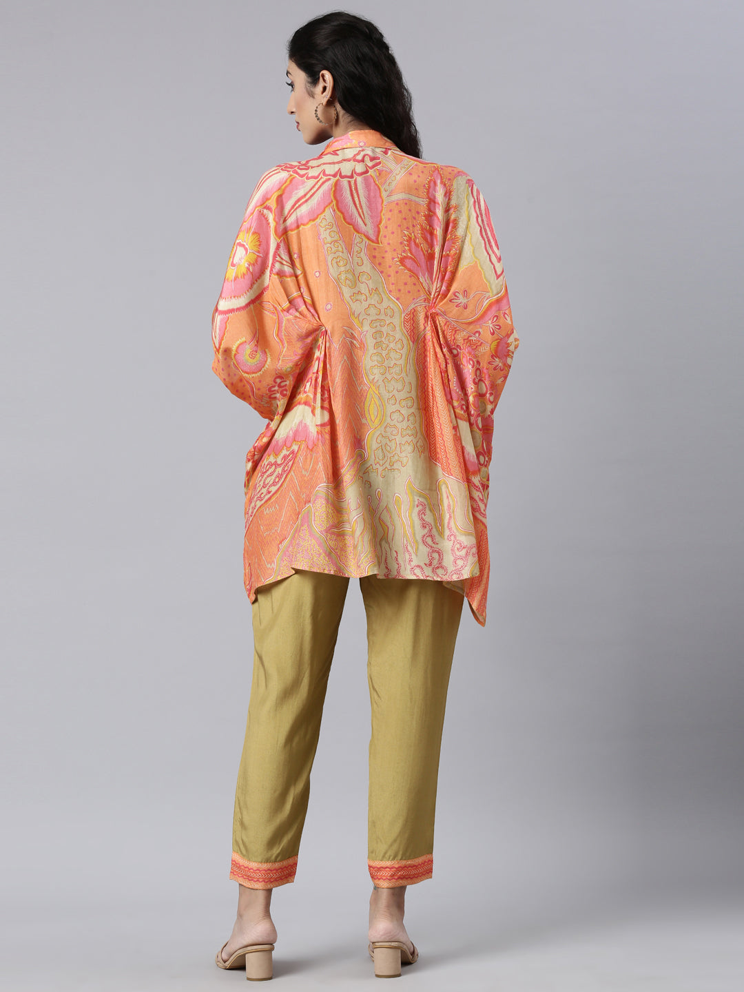 Neerus Orange muslin straight kurta set - side view