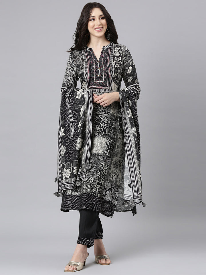 Neerus Black muslin straight suit set panelled kurta with trousers - front view