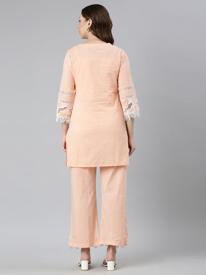 Neerus Orange cotton printed kurta set with trousers - side view