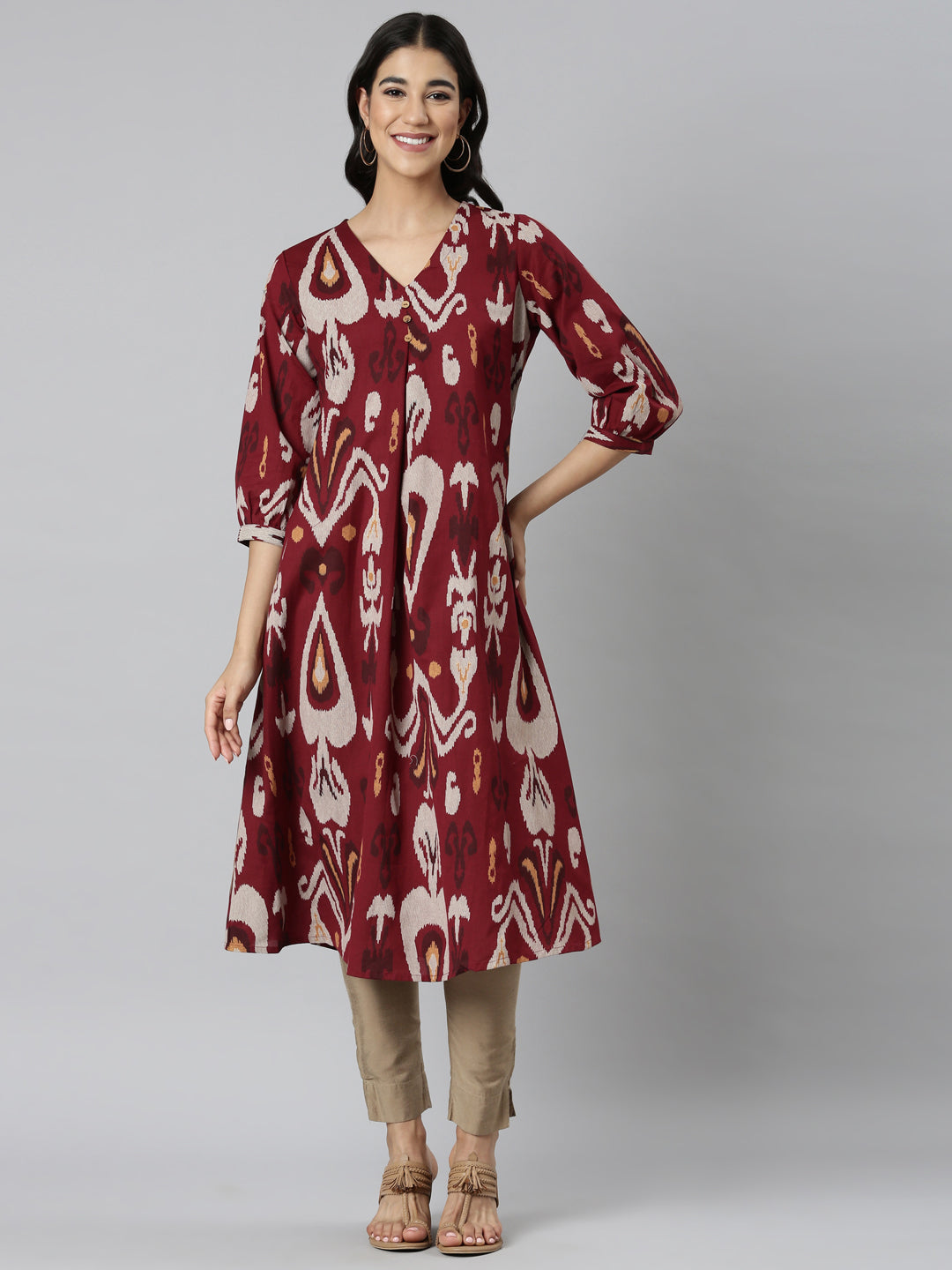 Neerus Maroon printed quirky straight kurti - front view