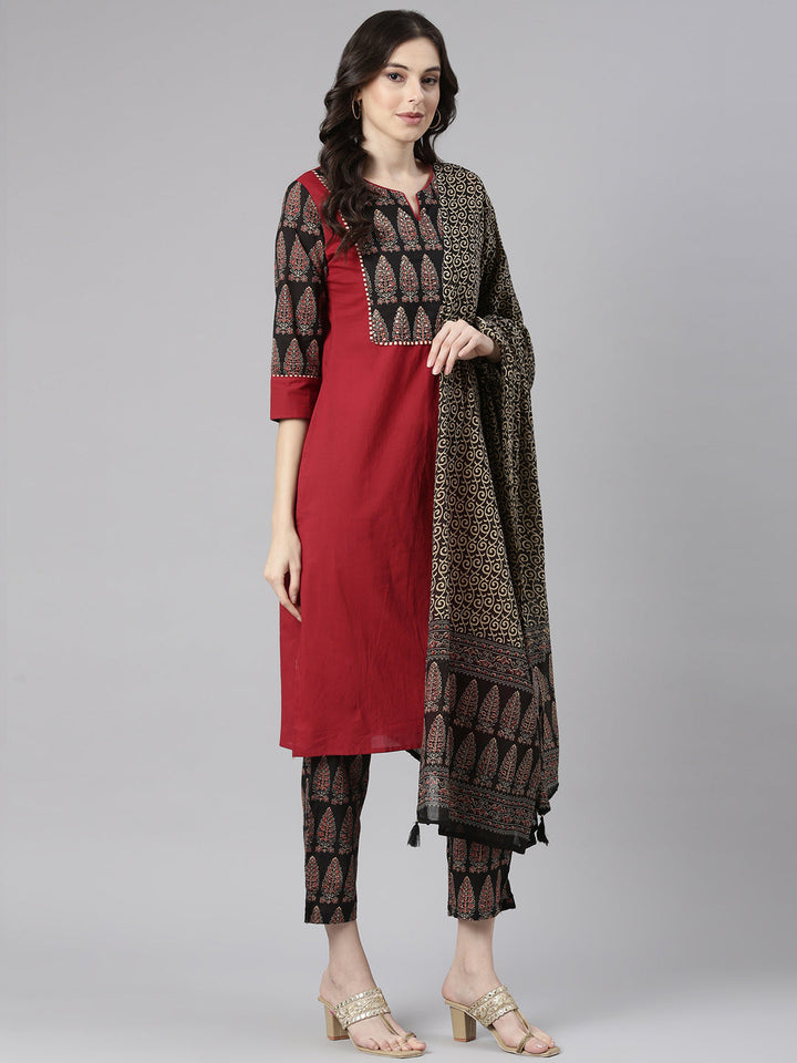 Neerus Maroon Solid Straight Kurta and Trousers With Dupatta
