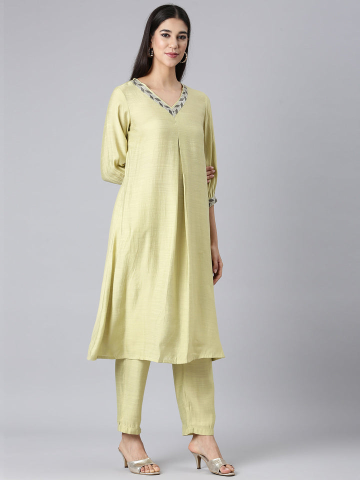 Neerus Green Solid Straight Kurta and Trousers