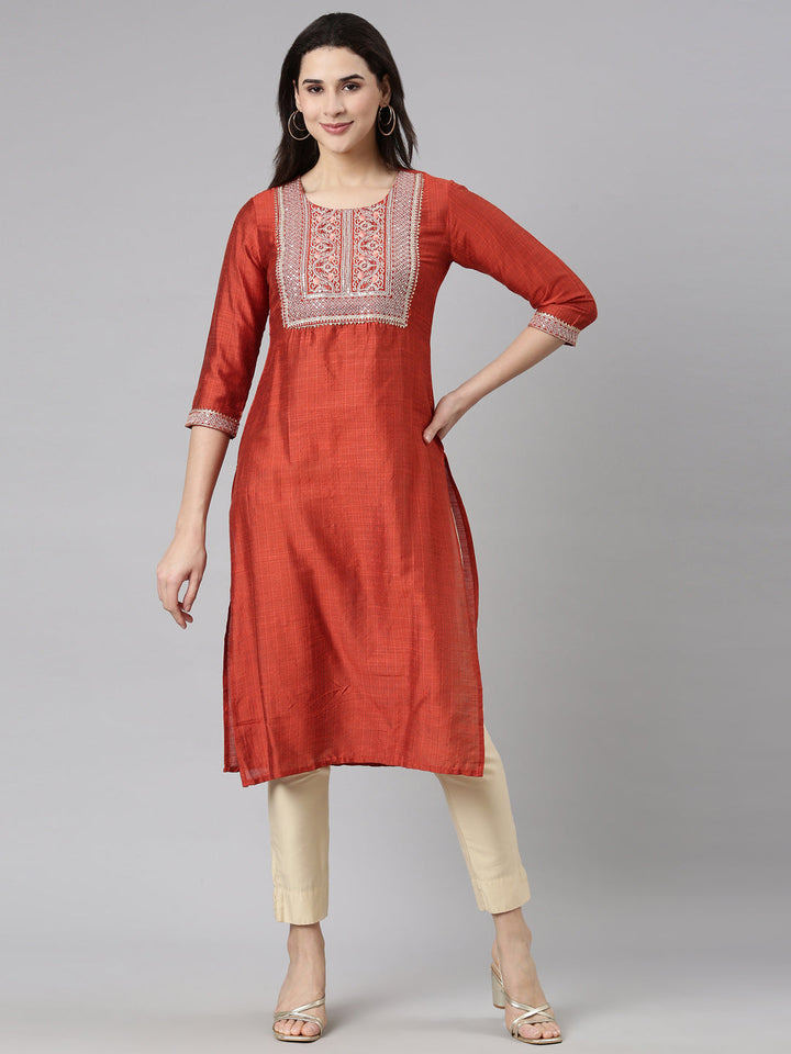 Neerus Orange solid straight kurti - front view