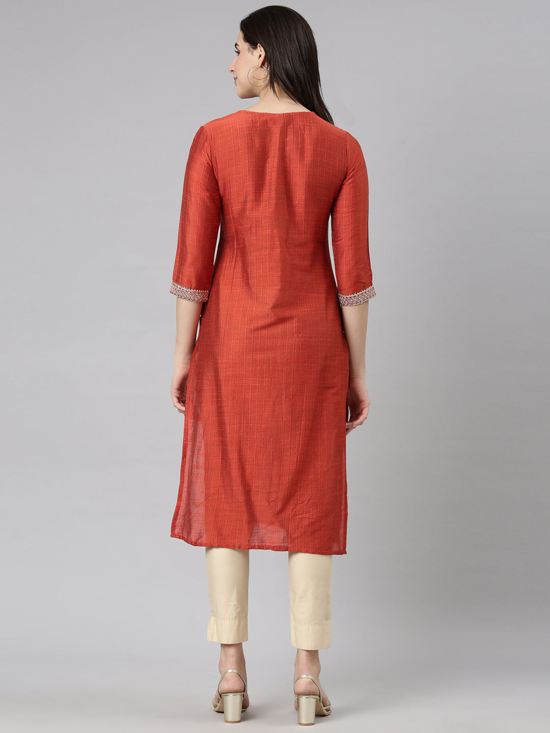 Neerus Orange solid straight kurti - side view