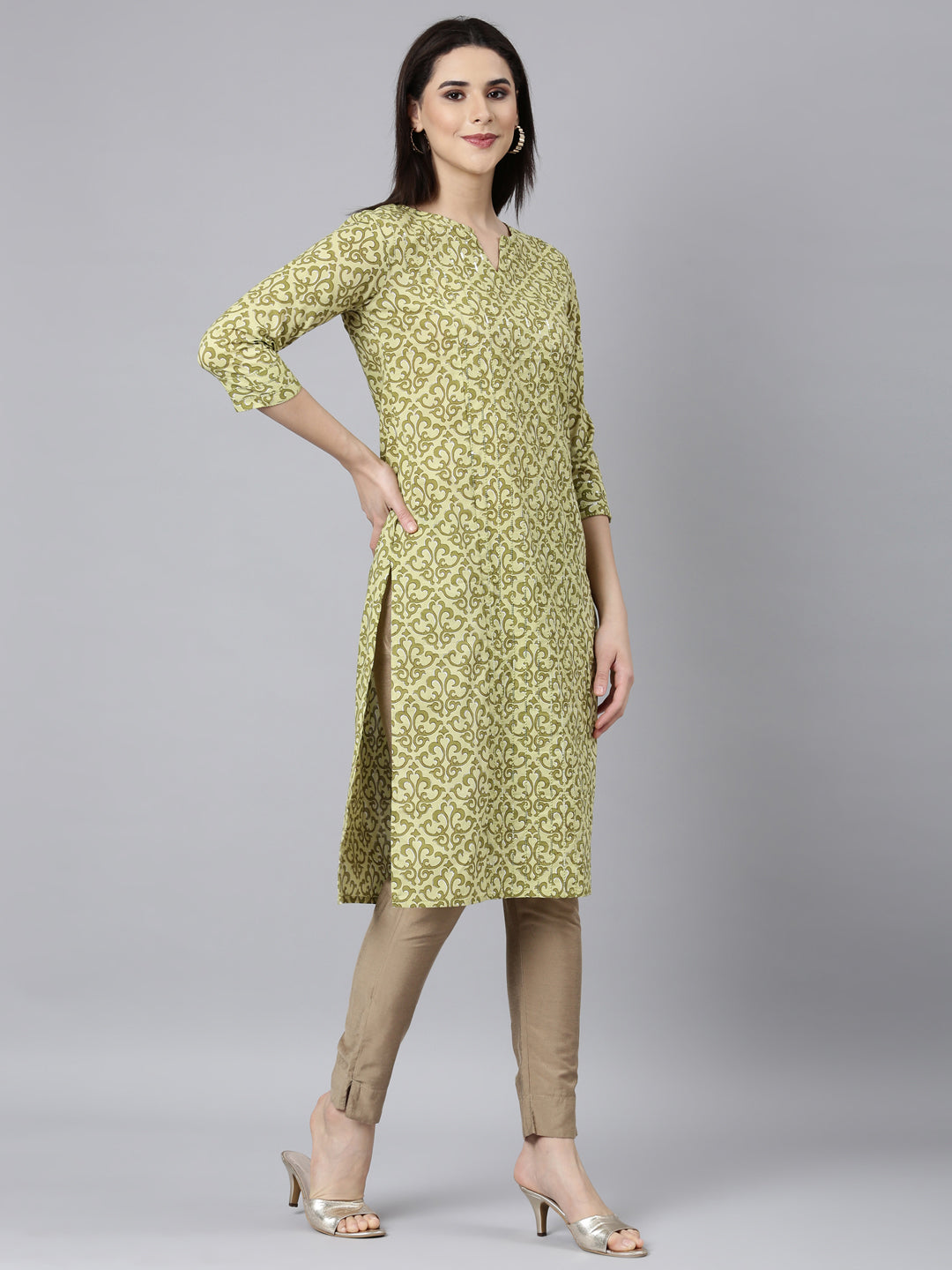 Neerus Green cotton printed straight kurti - back view