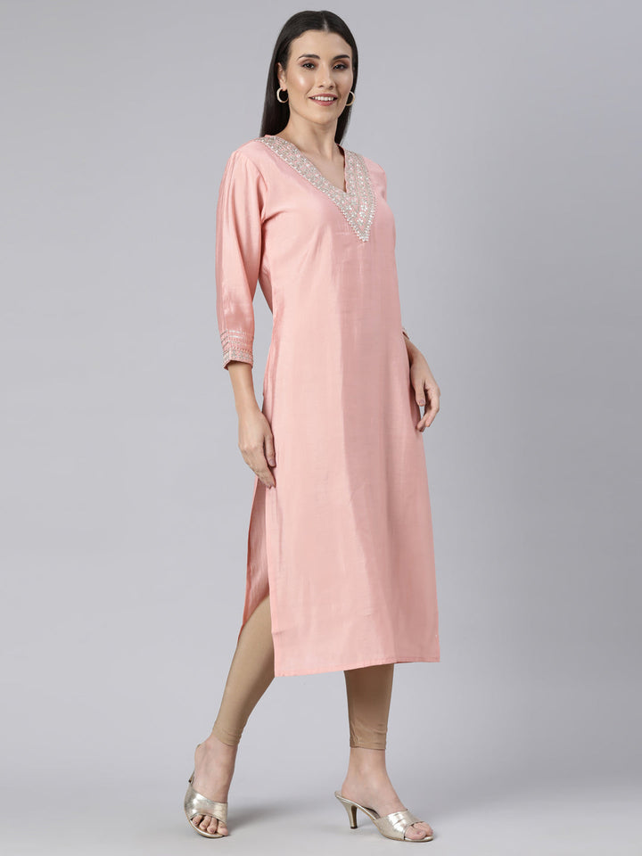 Neerus Orange solid straight kurti - back view
