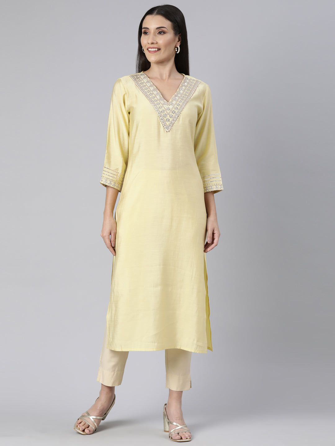 Neerus Yellow solid straight kurti - front view