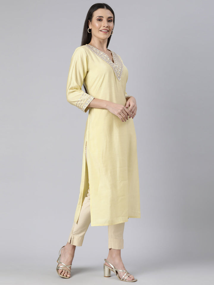 Neerus Yellow solid straight kurti - back view