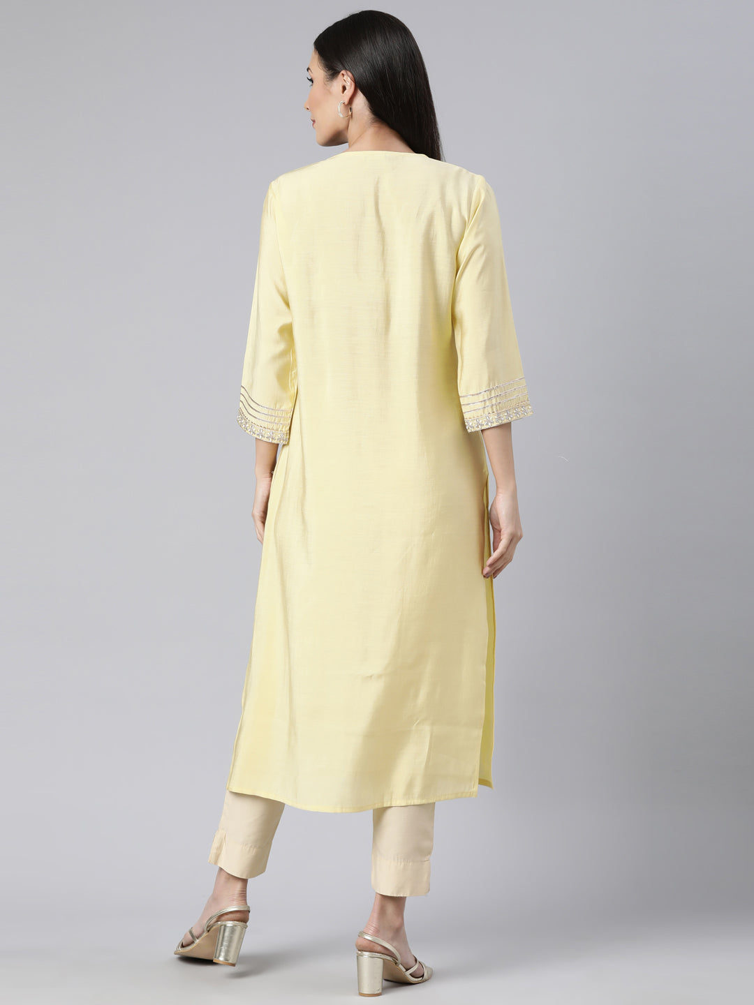 Neerus Yellow solid straight kurti - side view