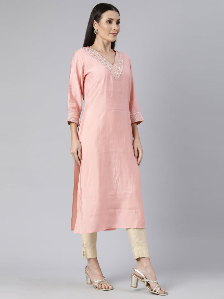 Neerus Orange solid straight kurti - back view