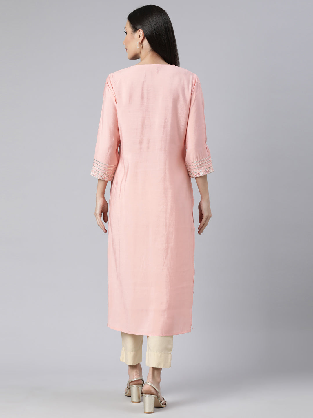 Neerus Orange solid straight kurti - side view