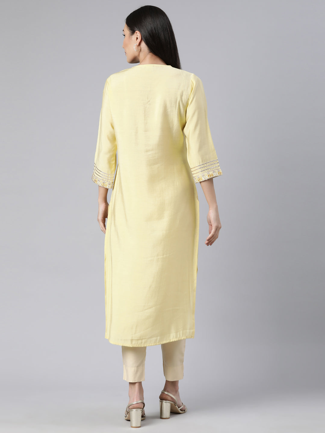 Neerus Yellow cotton solid straight kurti - side view