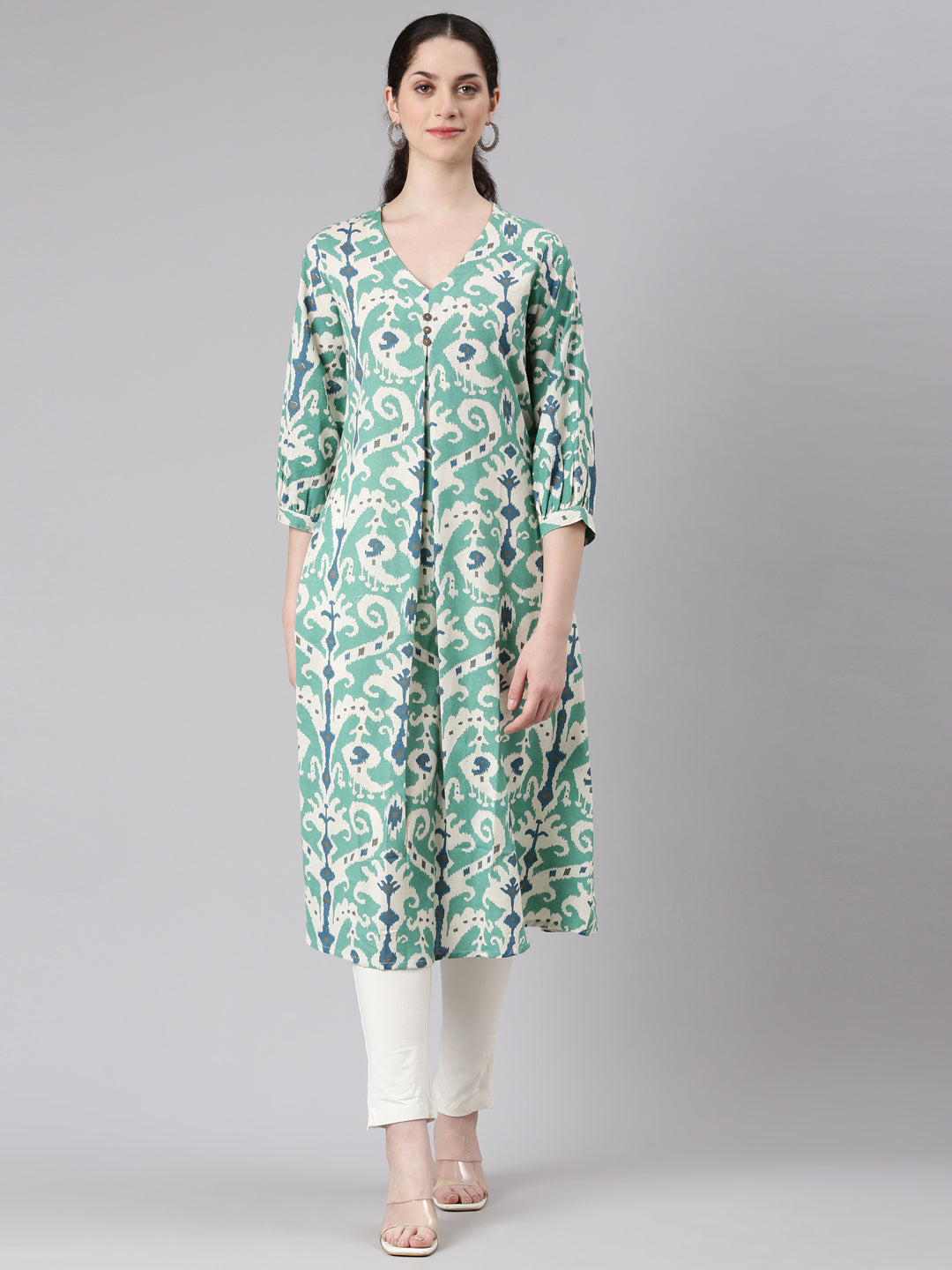 Neerus Green rayon printed curved kurti - front view